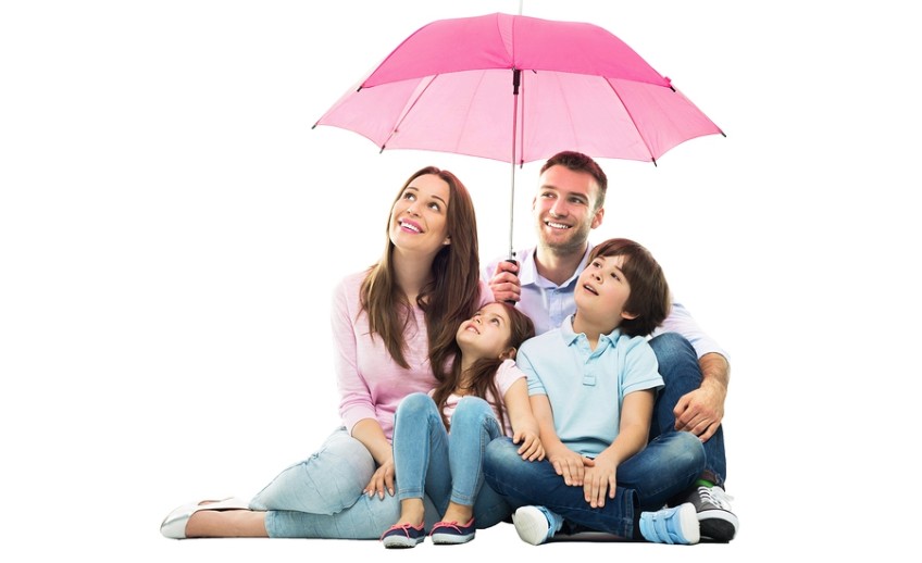 A Family Posing Below the Umbrella Image